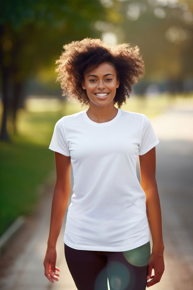 Black woman wearing white sport wear happy clothing apparel.