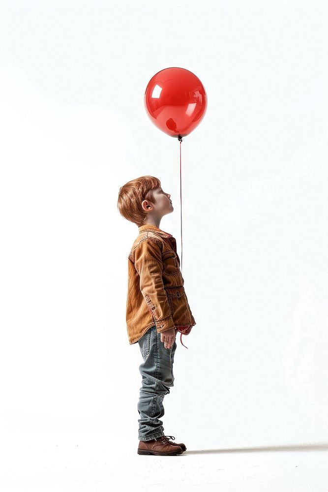 A kid holding balloon clothing footwear apparel.