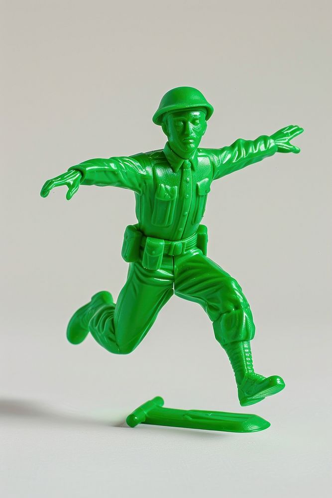 Plastic toy soldier doing jumping clothing apparel hardhat.