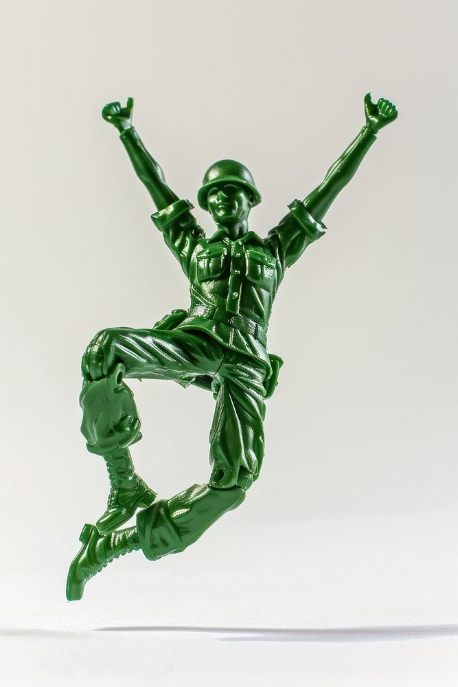Plastic toy soldier doing jumping person helmet human.