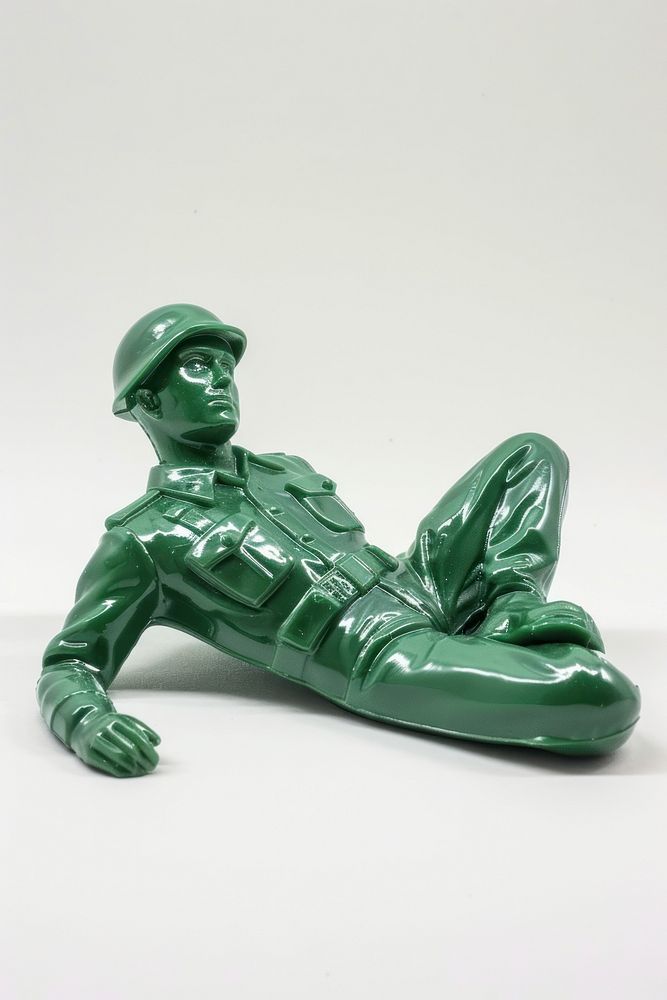 Plastic toy soldier doing laying accessories accessory gemstone.
