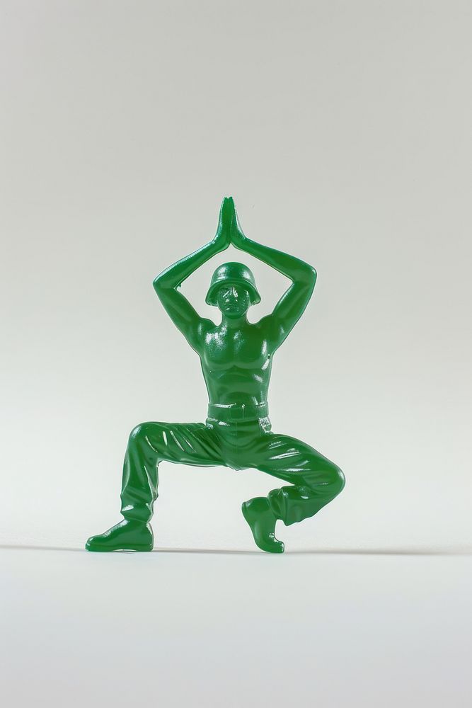 Plastic toy soldier doing yoga accessories accessory gemstone.