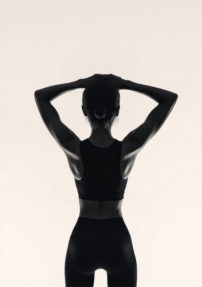 Woman pose wearing sportswear back silhouette photography.