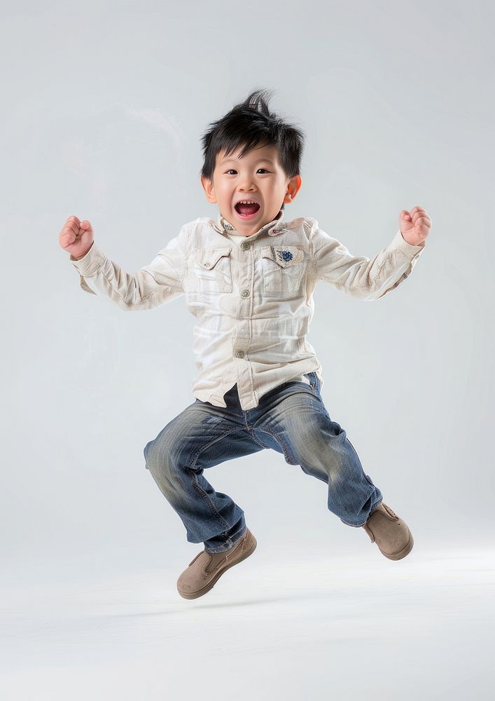 Asian boy is Jumping kid background jumping.