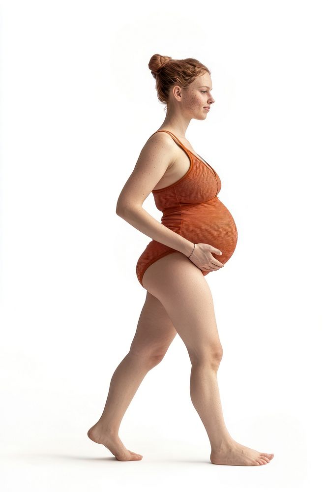 Pregnant woman walking orange confidence pregnancy.