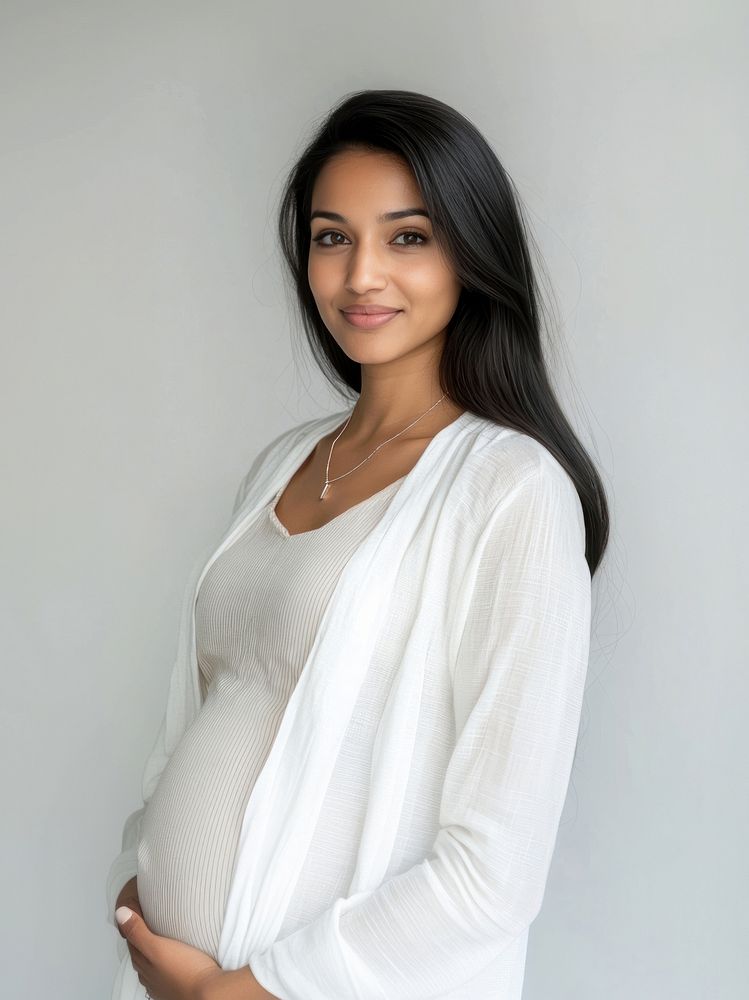 Happy half races british indian pregnant woman portrait necklace photo.