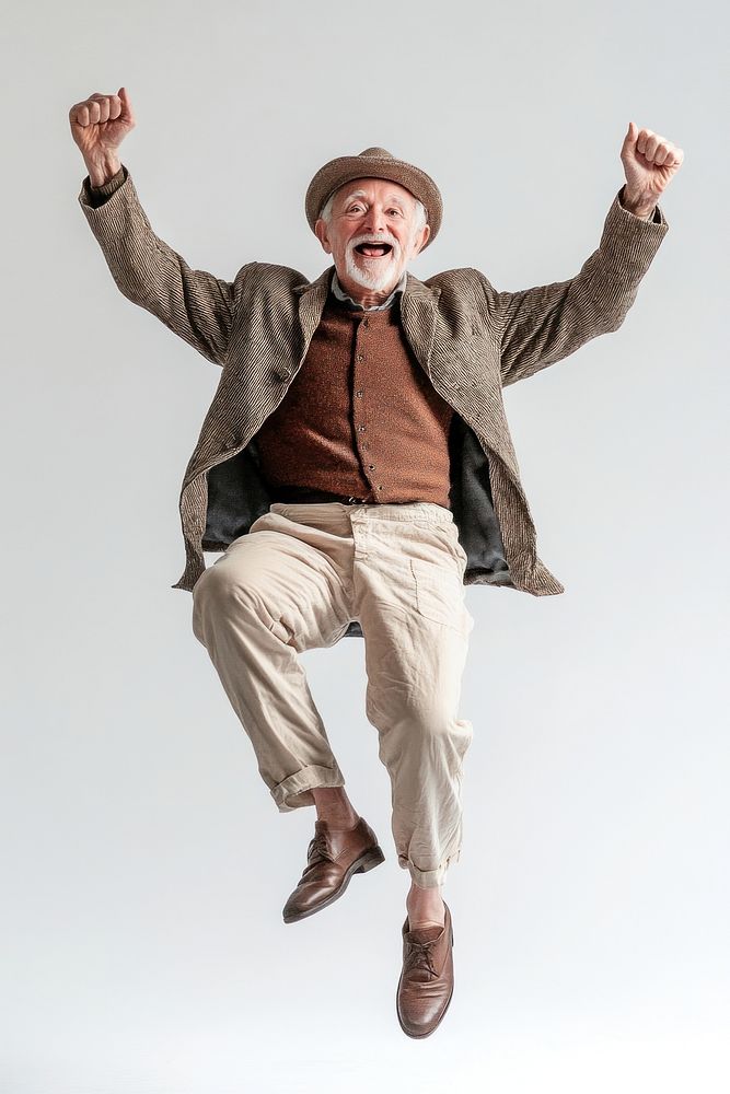 Senior Citizen Jumping in Joy background clothing elderly.