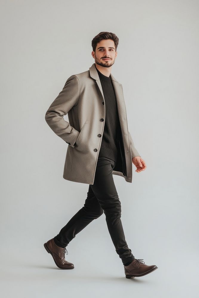 Man walking fashion style coat.