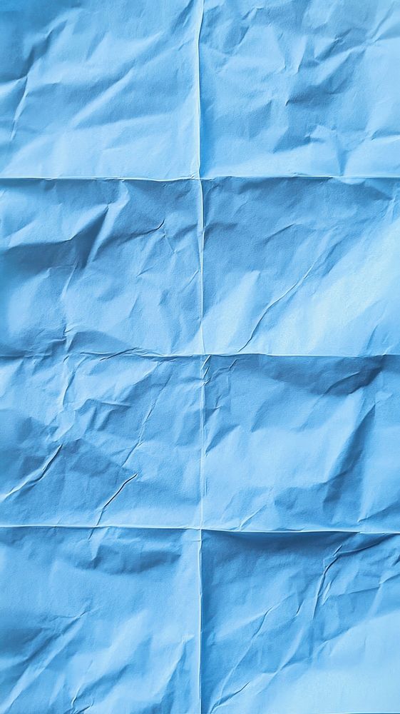 Blue sheet of paper background wallpaper wrinkled.