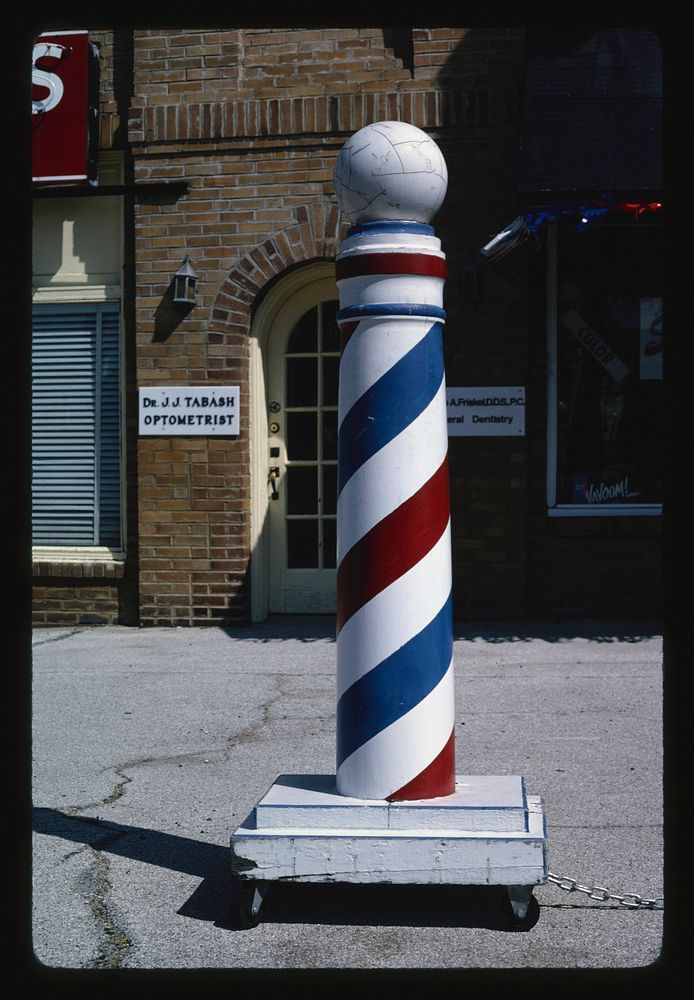 Styles By Billblack barber pole, Hampton Village, Missouri (1991) photography in high resolution by John Margolies. Original…