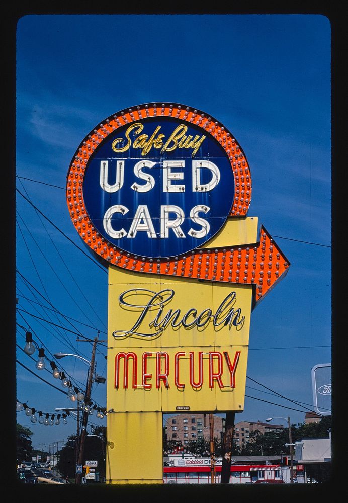 Safe Buy Used Cars sign, Quincy, Massachusetts (1984) photography in high resolution by John Margolies. Original from the…