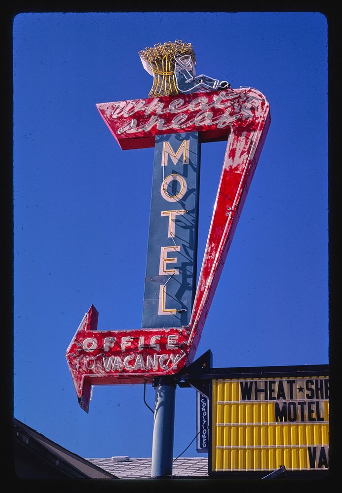Wheat Sheaf Motel sign, Chester, Montana (1987) photography in high resolution by John Margolies. Original from the Library…