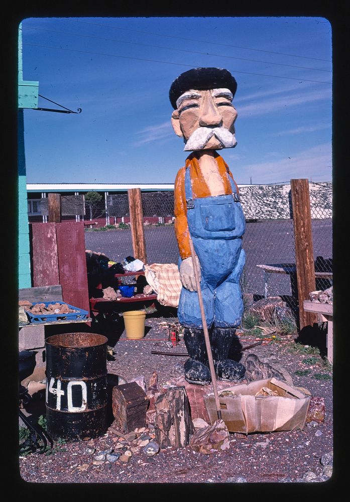 Petrified Rockery /Dutch prospector statue, Route 64, Valle, Arizona (1987) photography in high resolution by John…