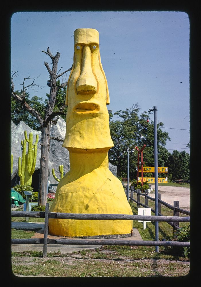 Yellow Easter Island statue 3, Wacky Golf, North Myrtle Beach, South Carolina (1979) photography in high resolution by John…