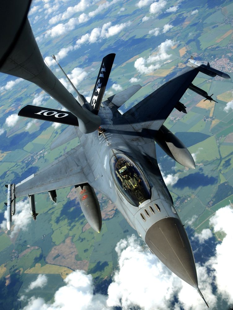 A U.S. Air Force F-16C Fighting Falcon aircraft receives fuel from an Air Force KC-135 Stratotanker aircraft assigned to the…