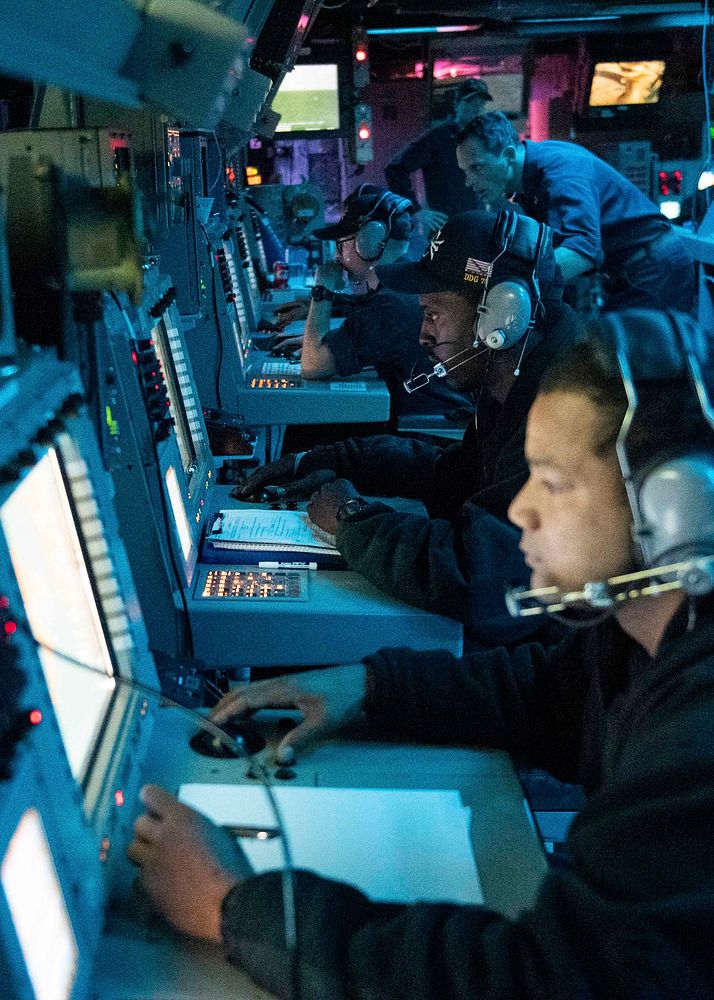 MEDITERRANEAN SEA (Nov. 4, 2020) Sailors participate in an air defense exercise in the combat information center aboard the…