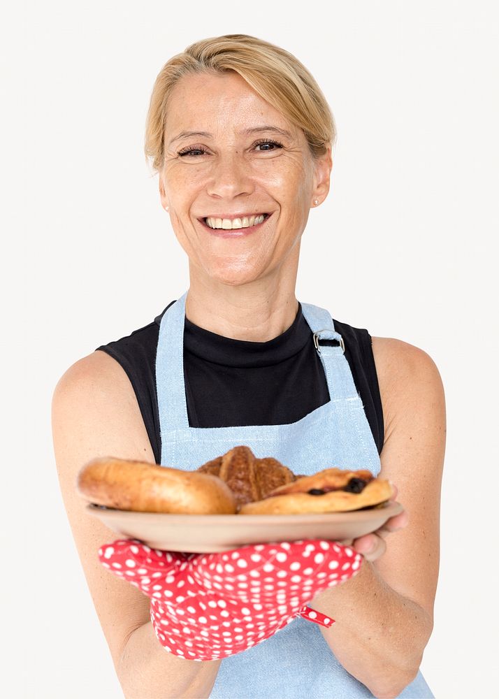 Female baker holding bread, isolated on off white