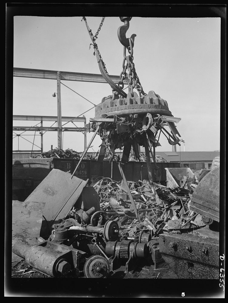 Automobile salvage. When the scrap is sorted, powerful electric cranes load it into freight cars--each type and grade in a…