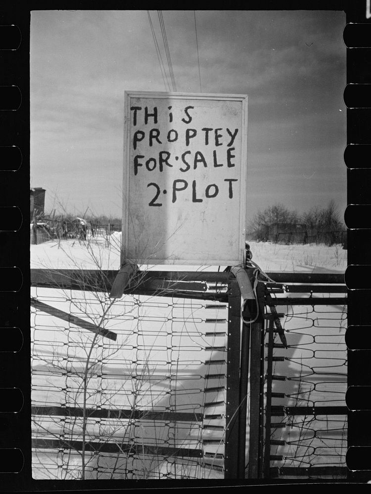 Sign on farmhouse, bedspring fence, Franklin Township, West New Brunswick, New Jersey. Sourced from the Library of Congress.