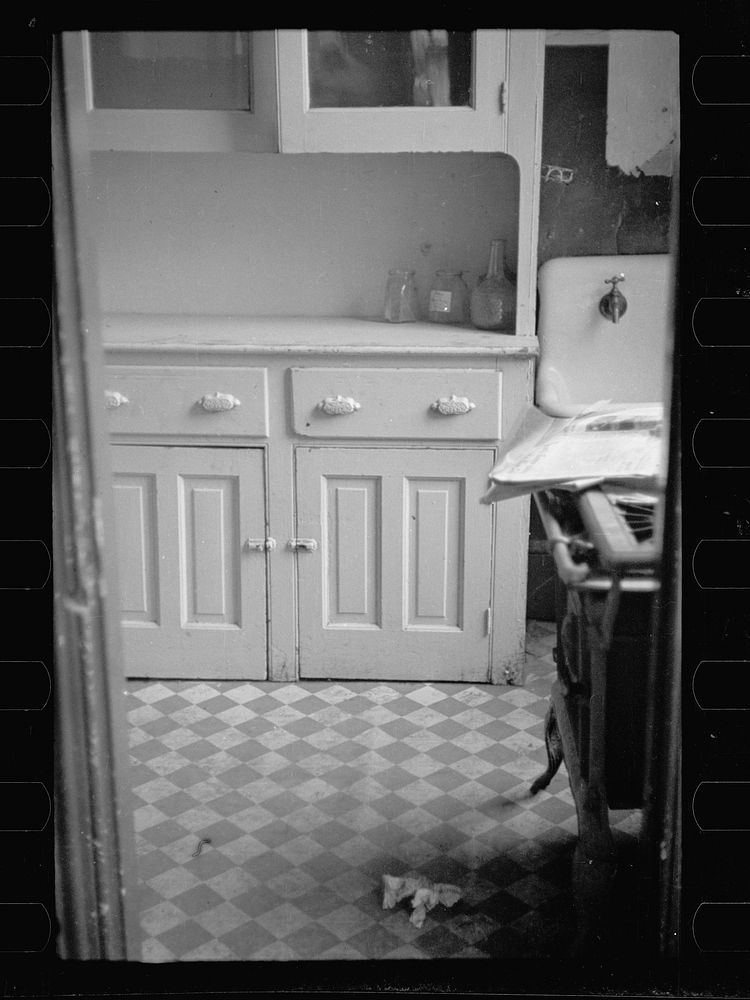 Kitchen of an apartment available for rent in the District of Columbia. Sourced from the Library of Congress.