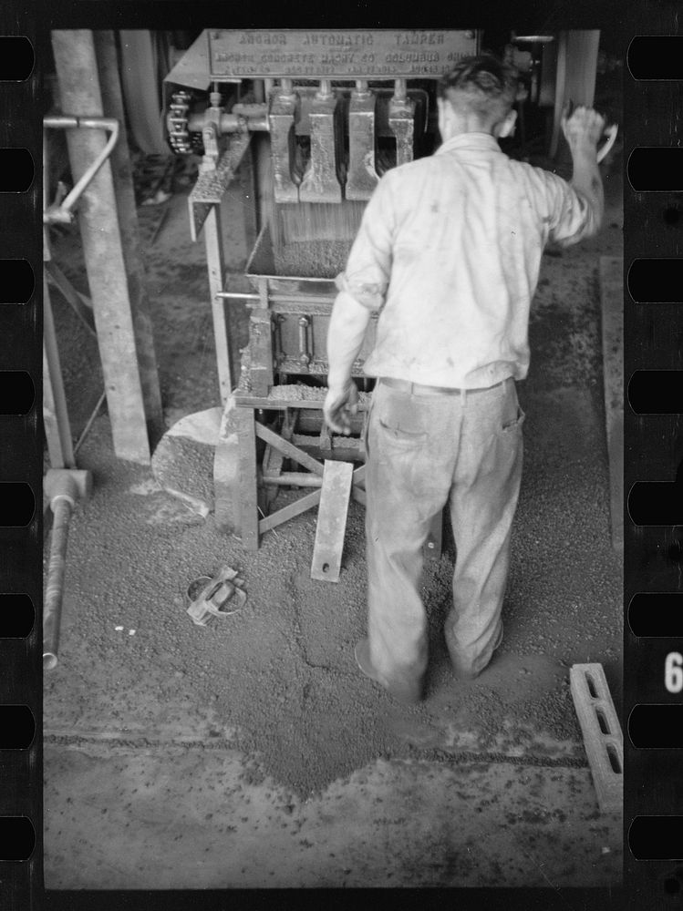 [Untitled photo, possibly related to: Making cinder block for use on the Greenbelt Project, Maryland]. Sourced from the…