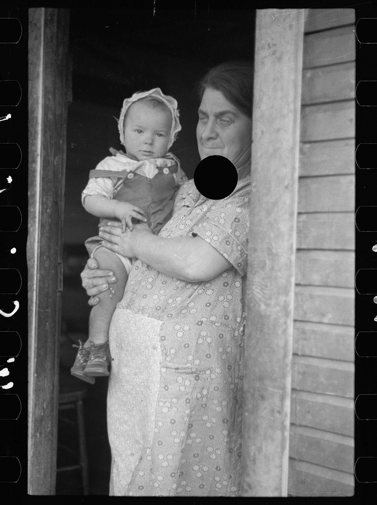 [Untitled photo, possibly related to: Wife of coal miner with grandchild. Kempton, West Virginia]. Sourced from the Library…