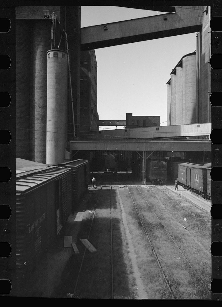 [Untitled photo, possibly related to: Freight car and flour mill, Minneapolis, Minnesota]. Sourced from the Library of…