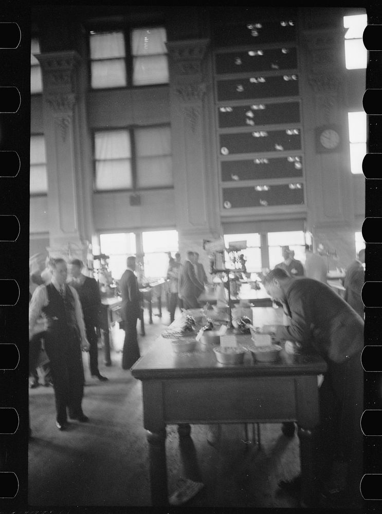 [Untitled photo, possibly related to: Buyer at open grain market, Minneaplis Grain Exchange, Minnesota]. Sourced from the…