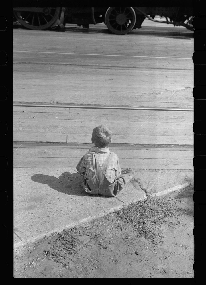 [Untitled photo, possibly related to: Child who lives on the other side of the tracks, Minneapolis, Minnesota]. Sourced from…