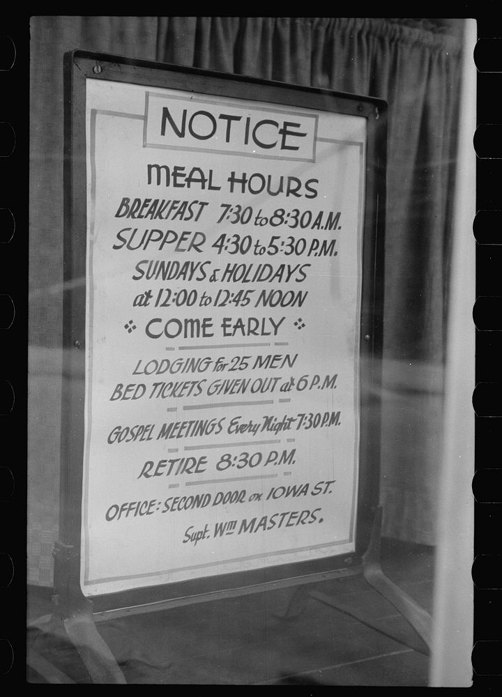 Sign in window of city mission, Dubuque, Iowa. Sourced from the Library of Congress.