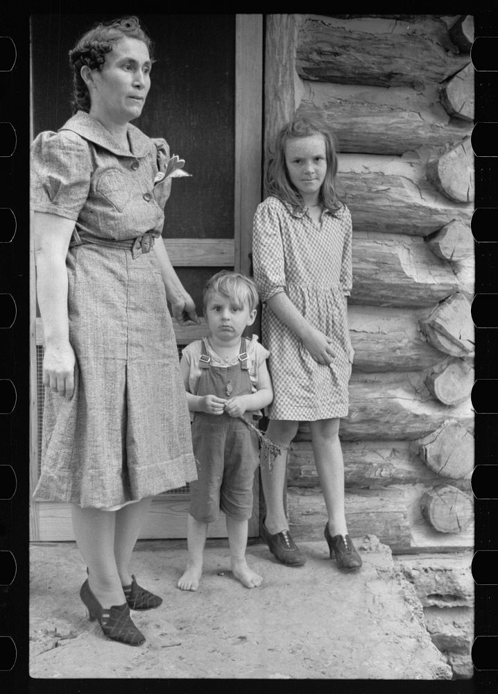 [Untitled photo, possibly related to: Children living in log cabin of Missouri, Ozark country]. Sourced from the Library of…