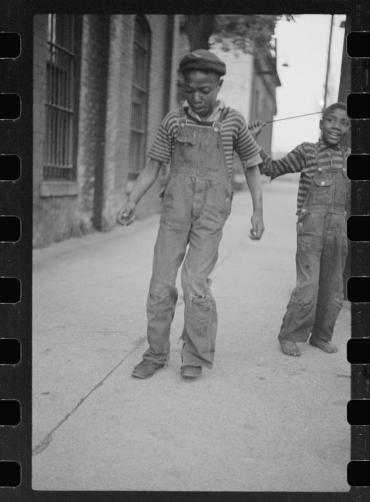 Boy dancing for arrivals at hotel, price five cents, Cairo, Illinois. Sourced from the Library of Congress.