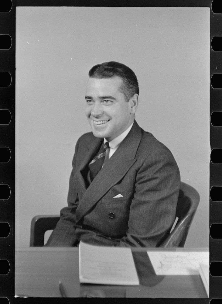 [Untitled photo, possibly related to: Mr. Kenneth Clark, Assistant Director of Information]. Sourced from the Library of…