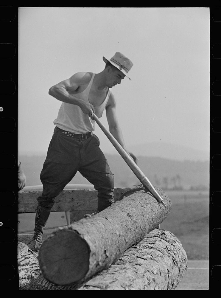 Lumber mill worker, Lowell, Vermont. Sourced from the Library of Congress.