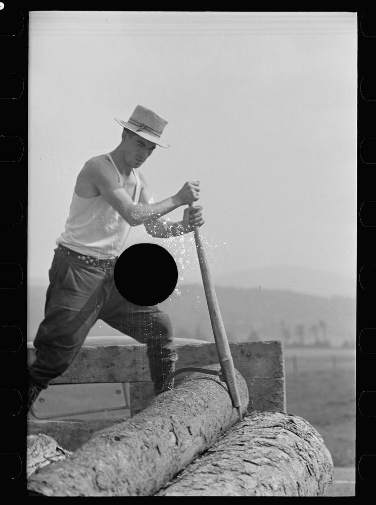 [Untitled photo, possibly related to: Lumber mill worker, Lowell, Vermont]. Sourced from the Library of Congress.