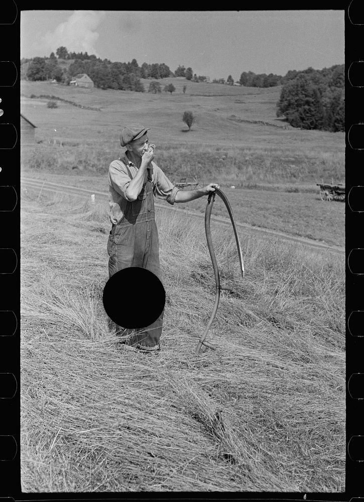 [Untitled photo, possibly related to: Sharpening a scythe, Windsor County, Vermont]. Sourced from the Library of Congress.