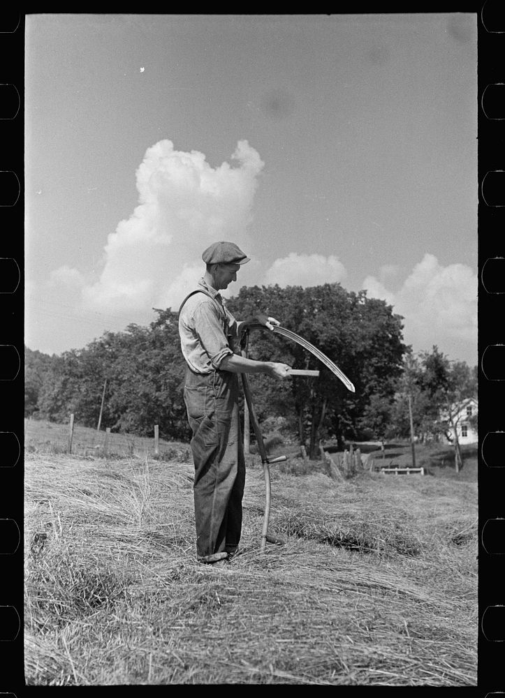 Sharpening a scythe, Windsor County, Vermont. Sourced from the Library of Congress.