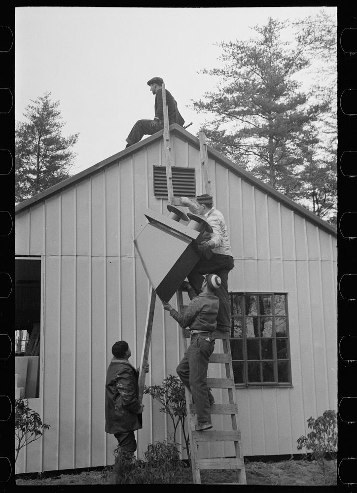 Constructing steel prefabricated house, Greenbelt, Maryland. Sourced from the Library of Congress.