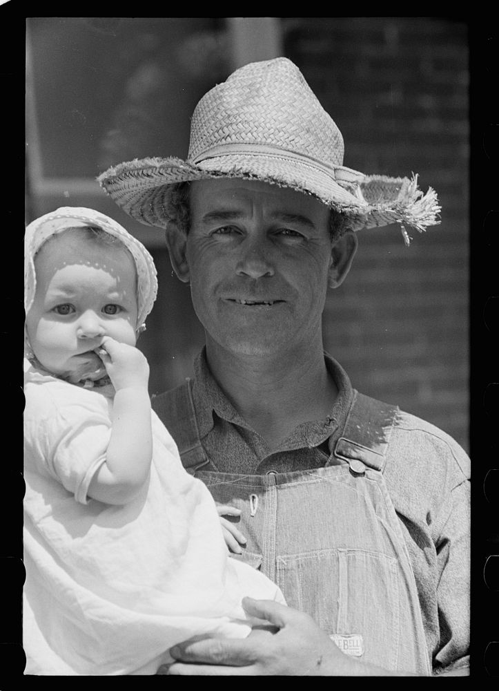 Farmer and child, Scioto Farms, Ohio. Sourced from the Library of Congress.