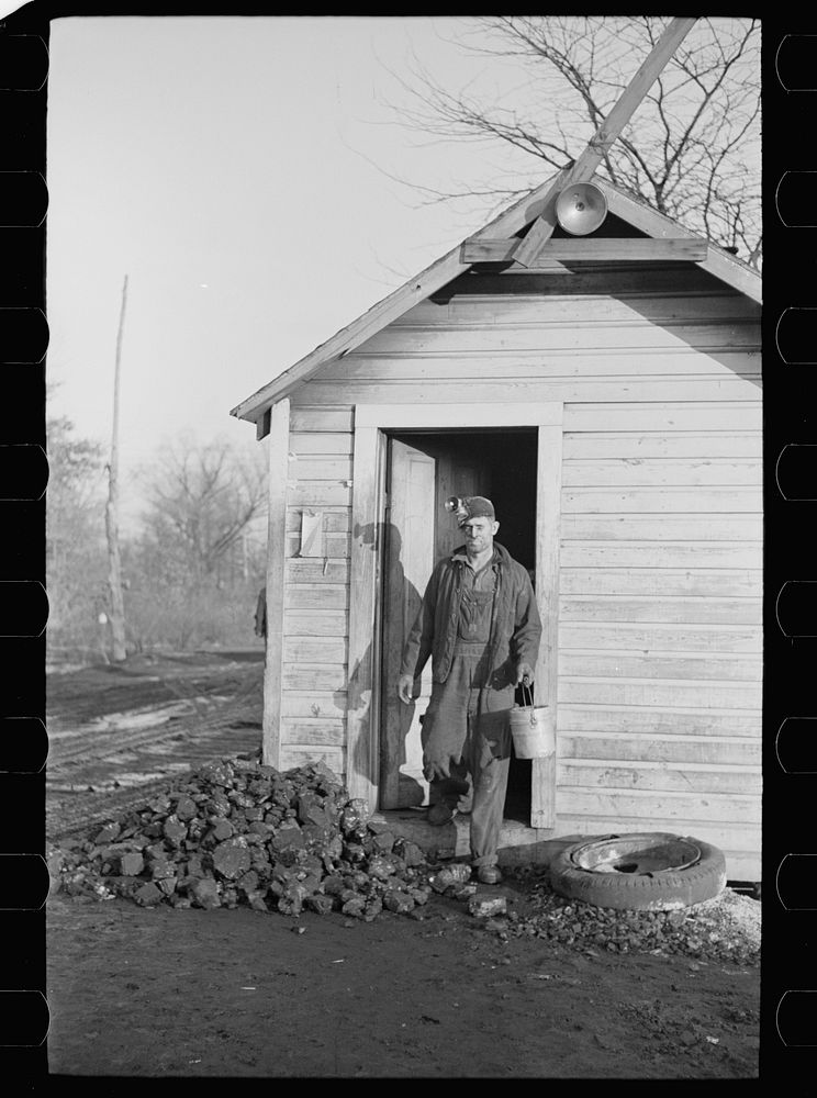 Gopher hole miner checking out at end of day's work. Williamson County, Illinois (see 26940-D). Sourced from the Library of…