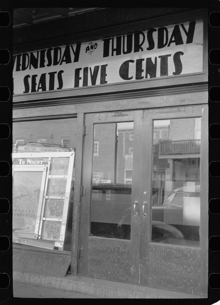 Moving picture theaters charge only five cents for admission, indicating a poor population, Eldorado, Illinois. Sourced from…