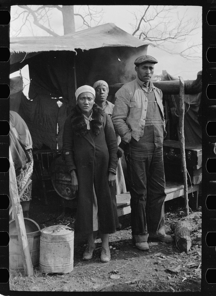 [Untitled photo, possibly related to: Sharecroppers being moved away from roadside by highway officials to area between…