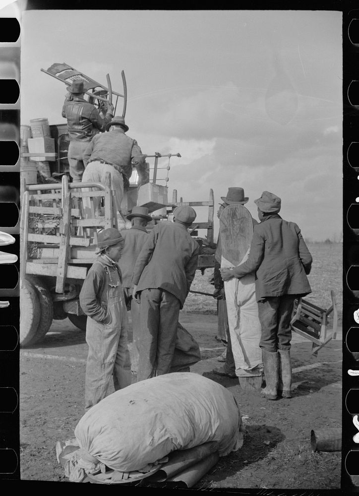 State highway officials moving sharecroppers away from roadside to area between the levee and Mississippi River, New Madrid…