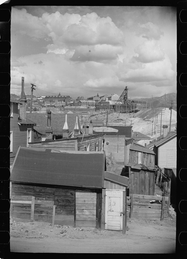[Untitled photo, possibly related to: Houses with mine hoists in backyard, Butte, Montana]. Sourced from the Library of…