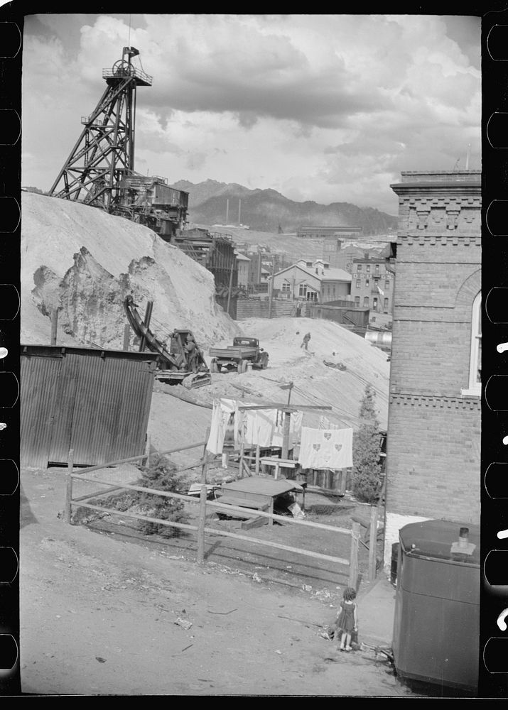 [Untitled photo, possibly related to: Houses with mine hoists in backyard, Butte, Montana]. Sourced from the Library of…