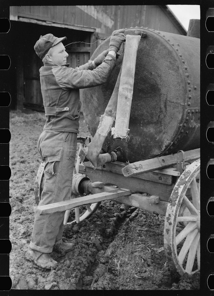 Farmer with water tank, Parke County, Indiana. Sourced from the Library of Congress.