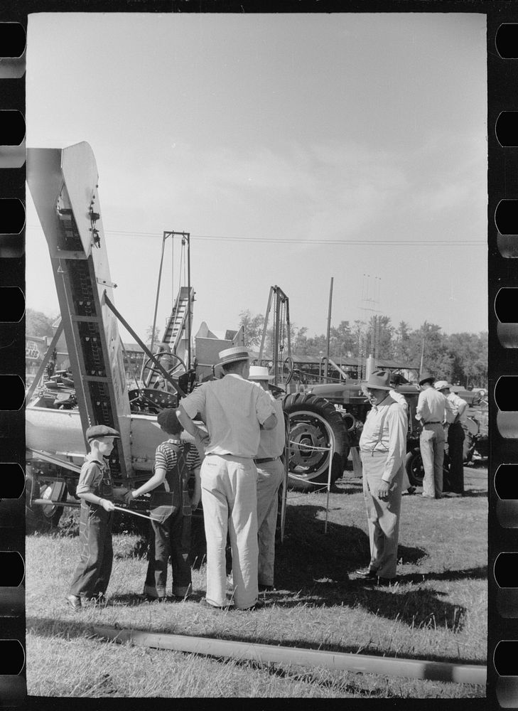 Farm machinery exhibit, Central Iowa 4-H Club fair, Marshalltown, Iowa. Sourced from the Library of Congress.