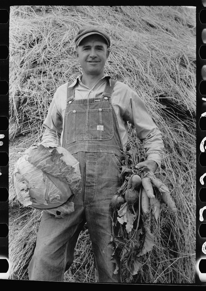 Howard Crowder displays some of the vegetables produced in his garden on San Luis Valley Farms, Alamosa, Colorado. Sourced…
