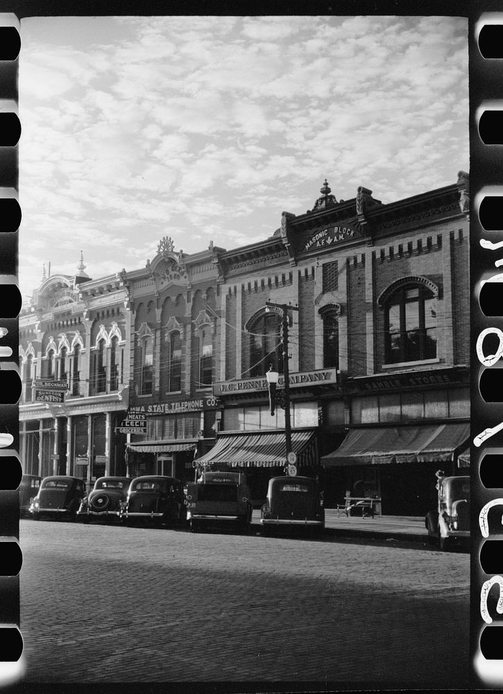 Stores on main street, Grundy Center, Iowa. Sourced from the Library of Congress.