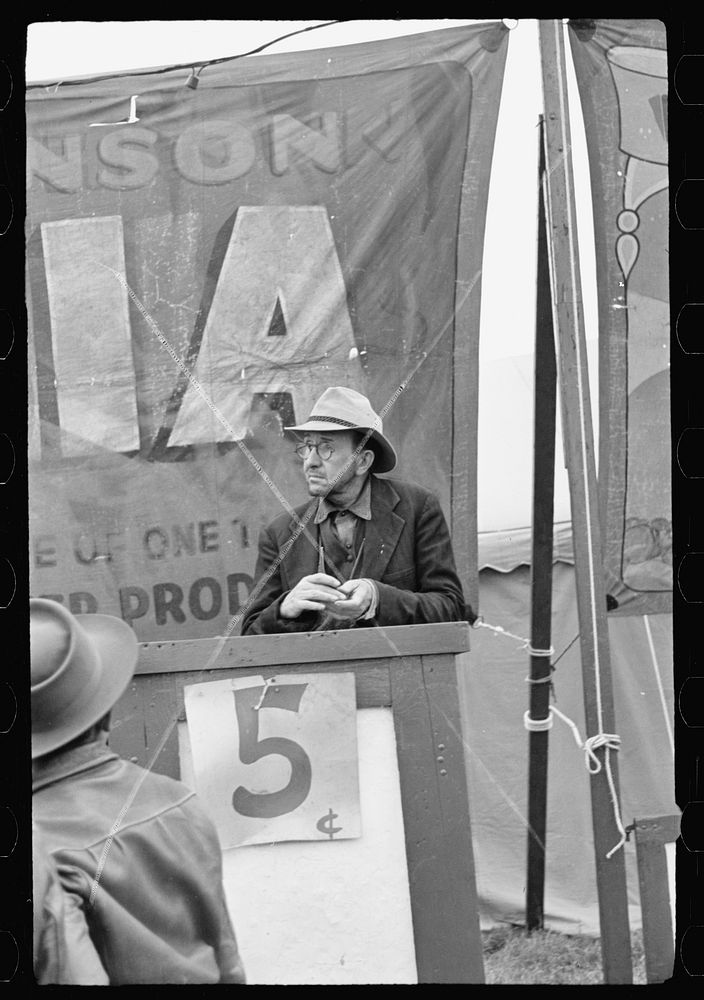 [Untitled photo, possibly related to: Ticket seller, carnival, Brownsville, Texas]. Sourced from the Library of Congress.